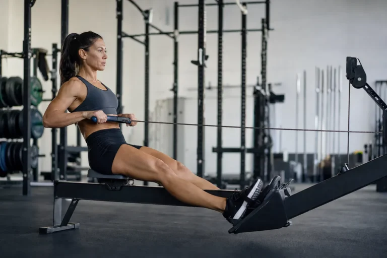 CrossFit rowing technique with a strong side profile on an indoor rower